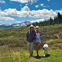 couple hiking with dog