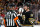 BOSTON, MASSACHUSETTS - MAY 12: Trent Frederic #11 of the Boston Bruins talks to referee Frederick L'Ecuyer #17 in Game Four of the Second Round of the 2024 Stanley Cup Playoffs at the TD Garden on May 12, 2024 in Boston, Massachusetts. The Panthers won 3-2. (Photo by Rich Gagnon/Getty Images)