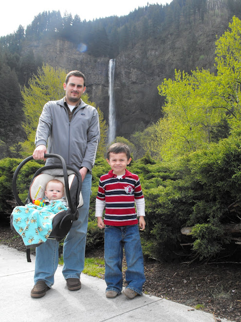 Hess Men pose in front of waterfall.  Portland, Oregon