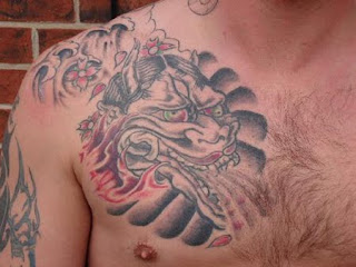 Men Chest Tattoo Design Photo Gallery - Chest Tattoo Ideas