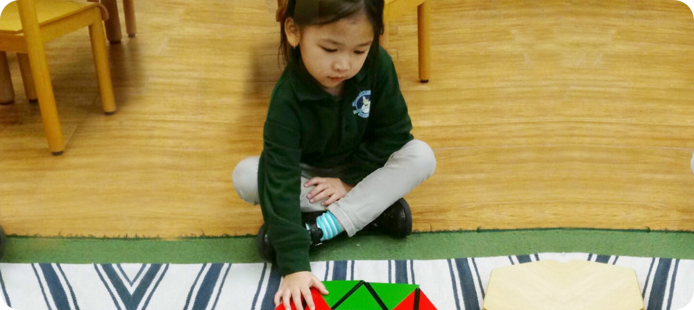 little girl playing puzzle