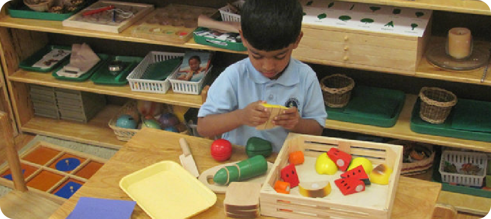 little boy playing shapes