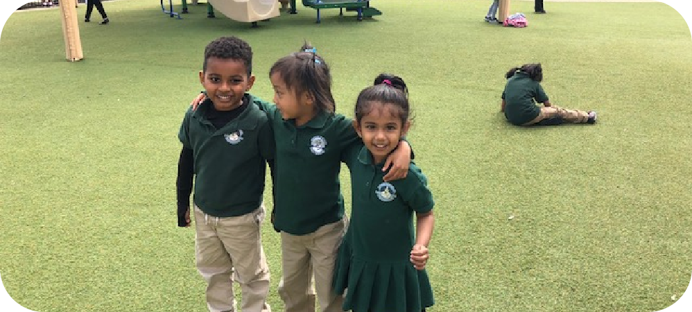 three little kids smiling