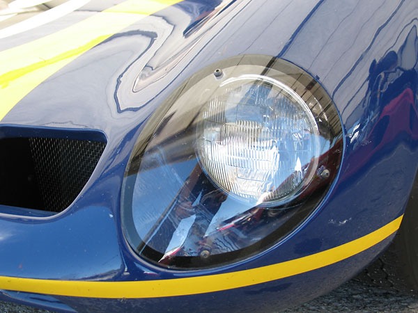 Perspex headlamp cover.