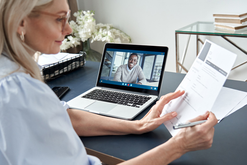 Women interviewing work candidate