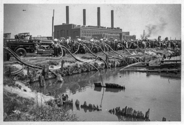 vintage Ahrens Fox fire engines at work