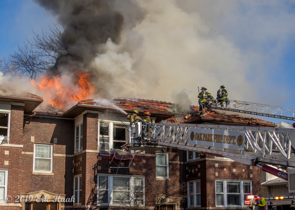 E-ONE platform aerial and E-ONE aerial ladder at fire scene