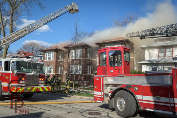 E-ONE platform aerial and E-ONE aerial ladder at fire scene