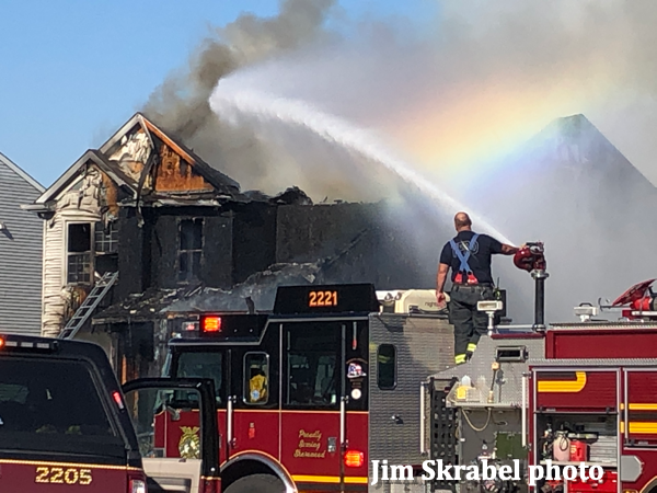 Firefighter uses deck gun on house fire