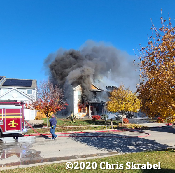 house engulfed in flames