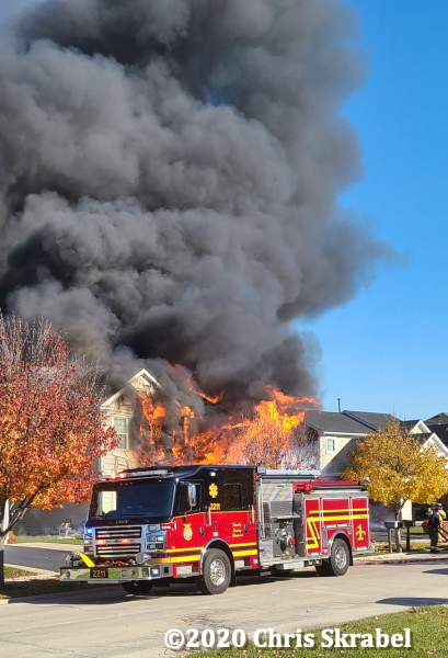 house engulfed in flames