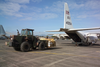 A U.s. Navy C-130t Hercules Assigned To The  Capital Express  Of Fleet Logistic Squadron Five Three (vr-53) Takes On Fresh Food For U.s. Forces. Image