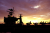 The Sun Sets Over The Flight Deck Of Uss John C. Stennis (cvn 74) During A Scheduled Underway Period Image