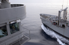 Capt. Michael R. Groothousen, Commanding Officer Of The Harry S. Truman, Oversees An Early Morning Underway Replenishment (unrep) From Auxiliary Control. Image