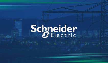 Schneider Electric logo overlaying a background of power lines and a cityscape with buildings illuminated at night.