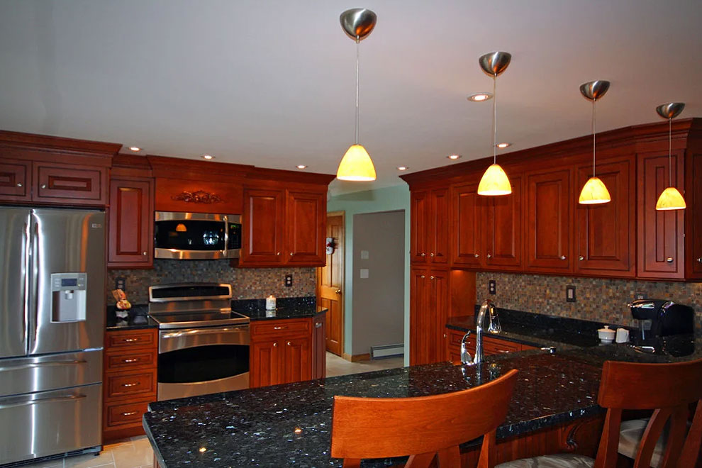 emerald pearl granite countertop cherry cabinets