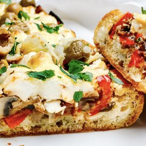 Photograph of Olive Ciabatta Loaded with Red Pepper, Mushrooms and Feta Cheese