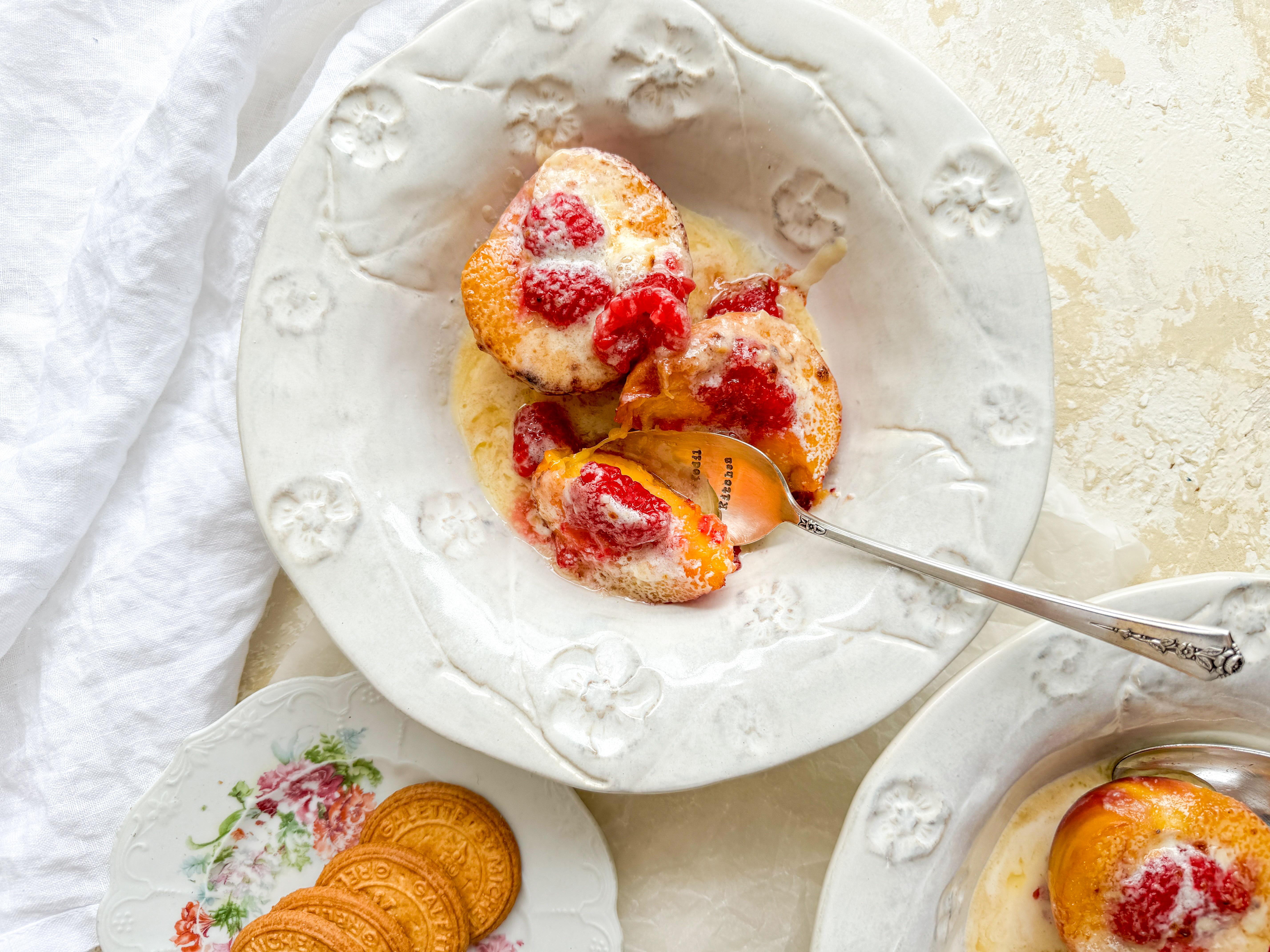 Photograph of Grilled Peaches with Mascarpone and Raspberries