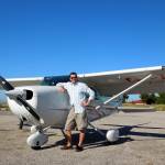 A man preparing to fly a Cessna 172 to Paros in the Aegean Sea.