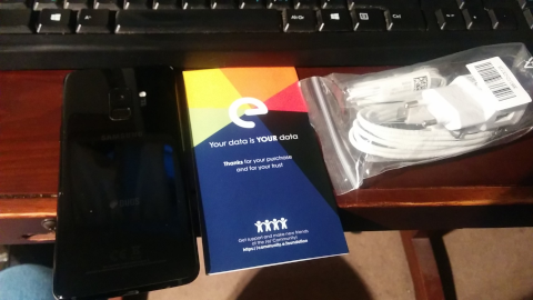 The phone, booklet and USB cable