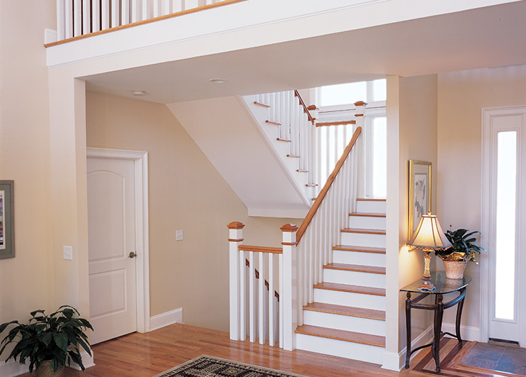 Wood newels for stair systems