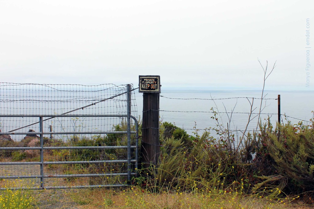 No trespassing sign, view of the ocean