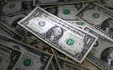 Dollar hits nine-month low versus yen as Fed debate reignites