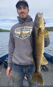 image of angler holding big walleye