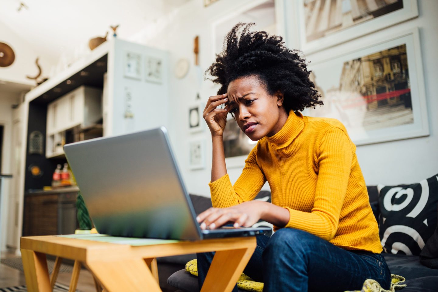 Woman looking disengaged on a video call.