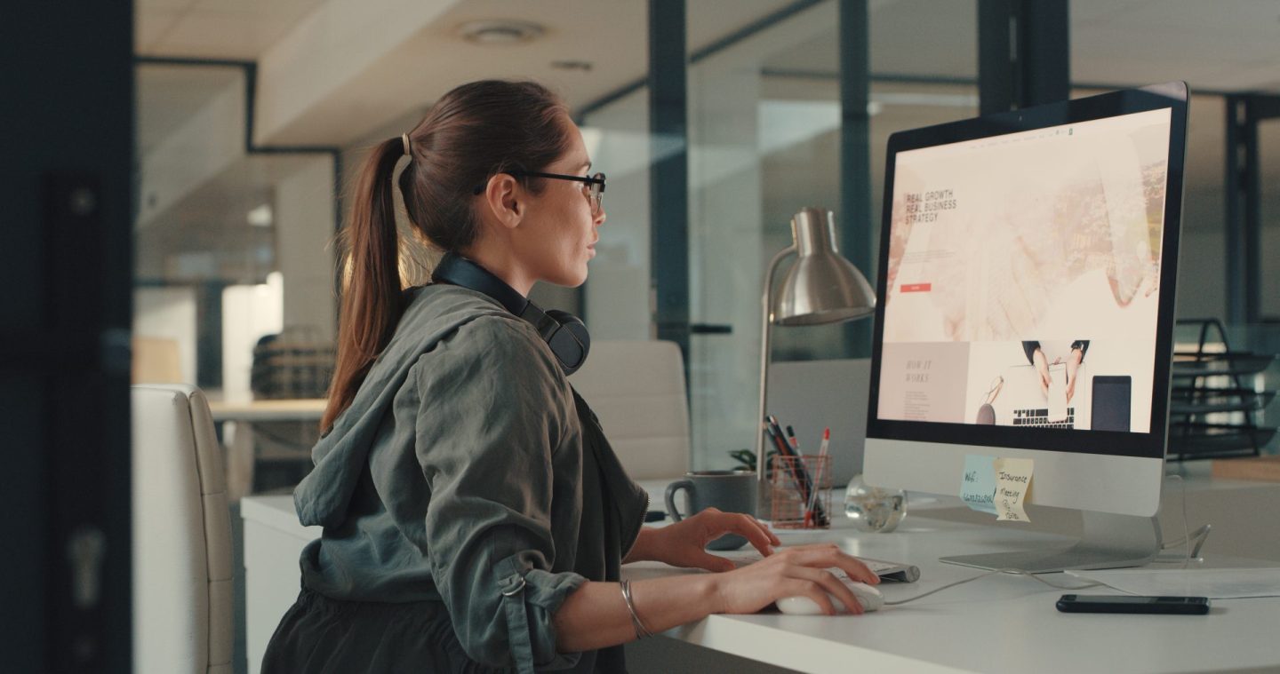 Shot of a young designer working on a computer in an office