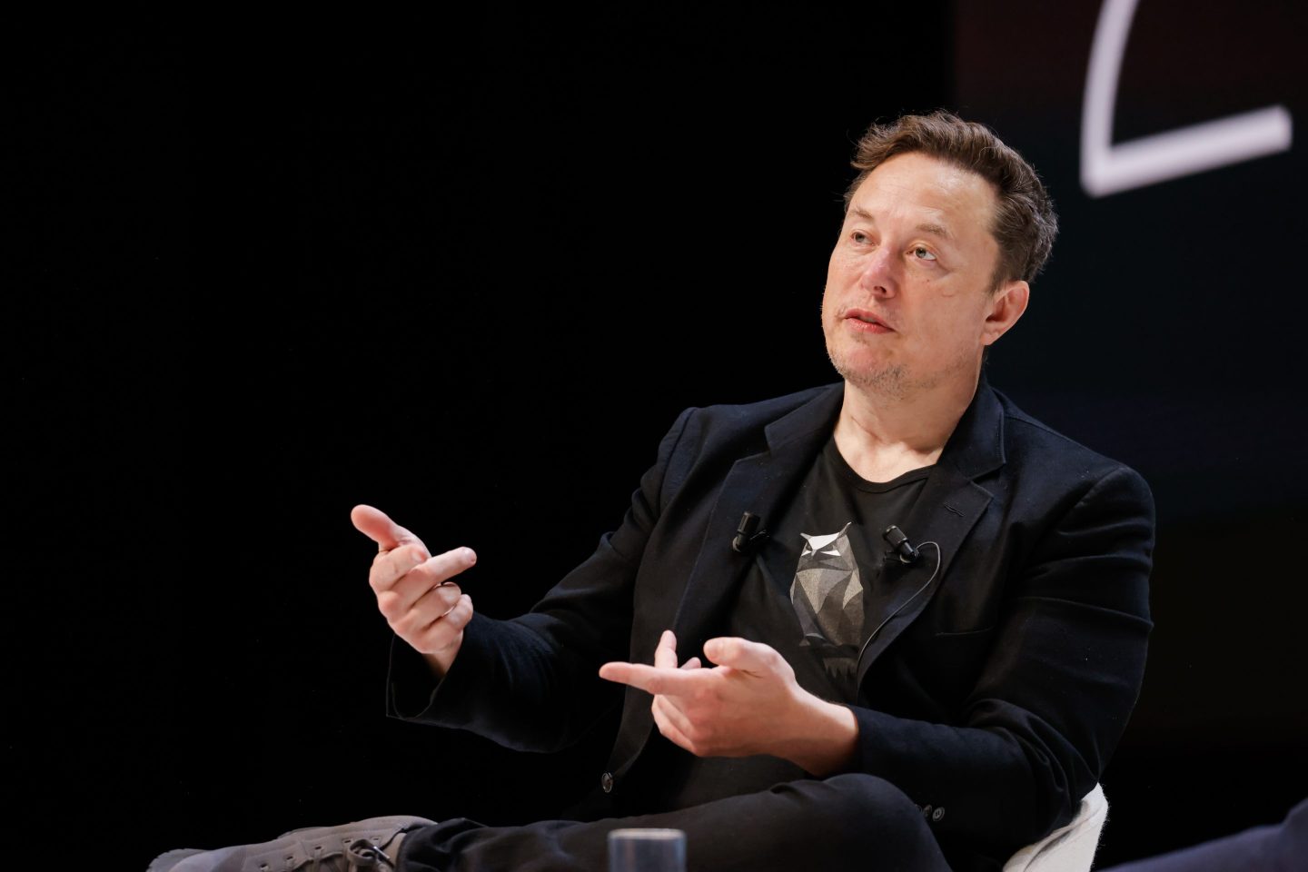 elon musk speaking on stage