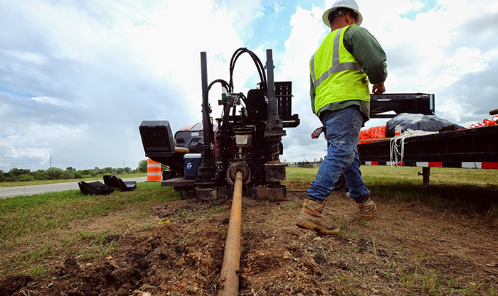 contractor laying google fiber in the ground