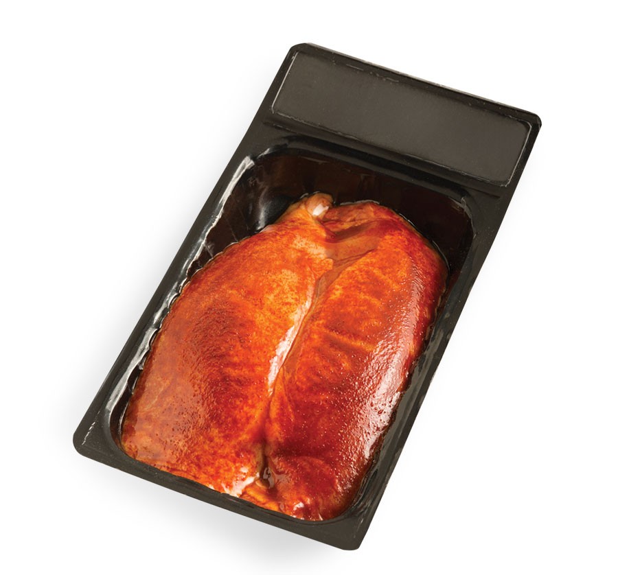 Vacuum-sealed seasoned boneless skin-on chicken breasts