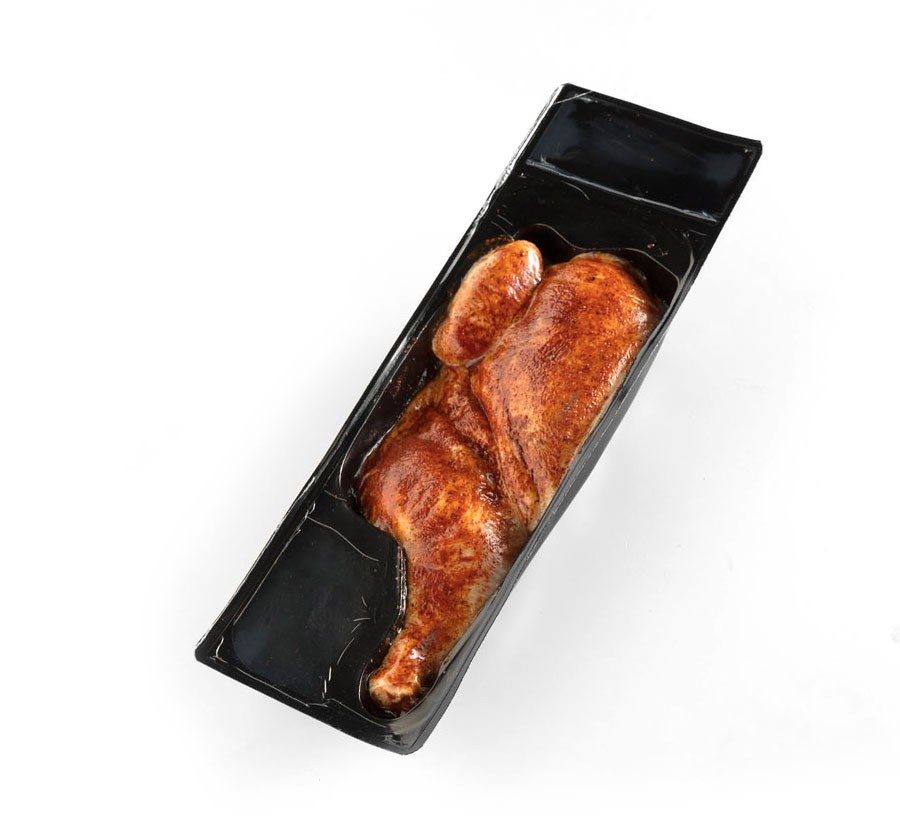 Vacuum-sealed seasoned flattened half-chicken