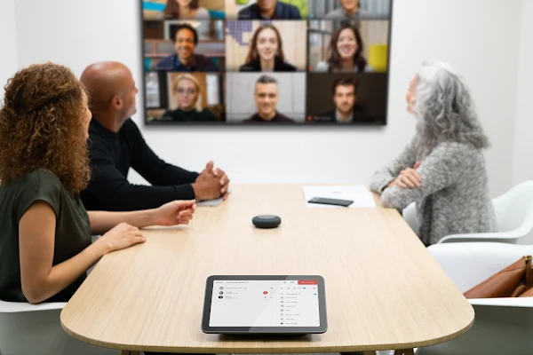 Team using Google Meet hardware for video conferencing 