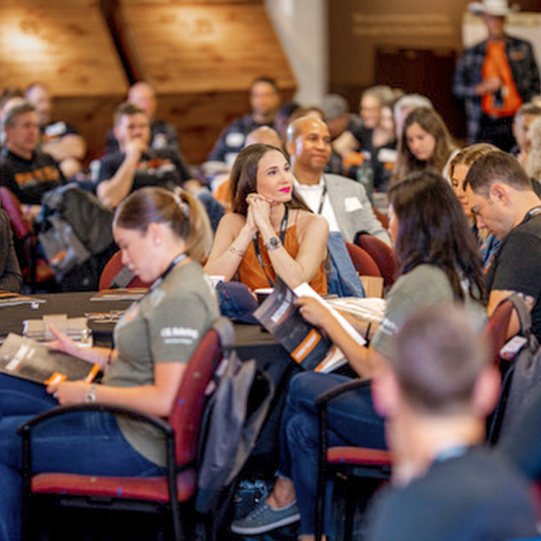 Attendees of the Bunker Labs 2019 National Summit sitting together in a conference room