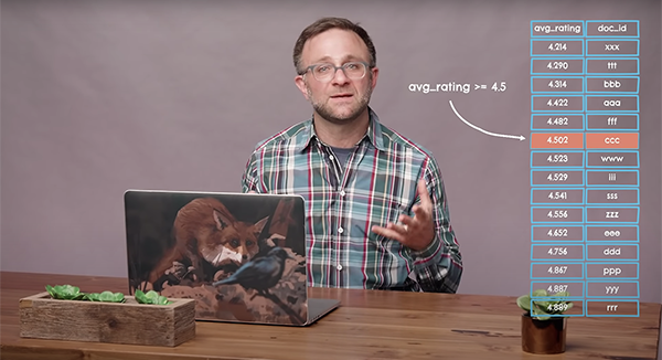 Video thumbnail of man in plaid shirt sitting at desk facing an open laptop