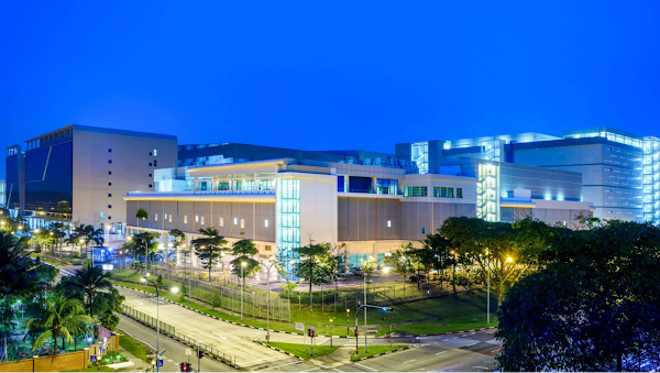 Data center with lights on at dusk