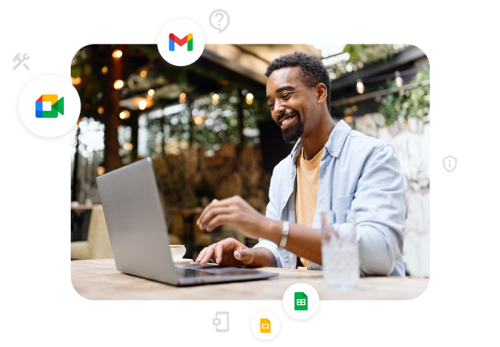 ノートパソコンを使用している Google Workspace のお客様と Google Meet、Gmail、スライド、スプレッドシートのアイコンが表示されている画像。