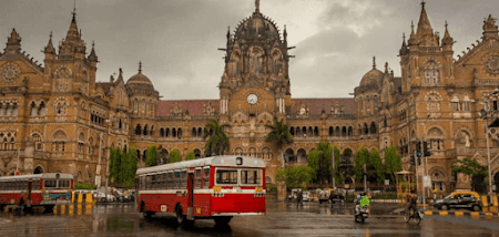 Bus in front of an ornate building in India