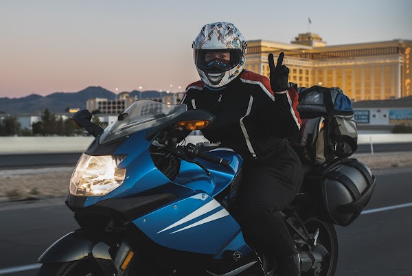 Helmet resting on motorcycle.