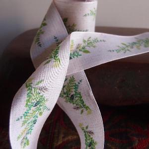 1 1/2" Tan ribbon with green leaves - 1.5" x 10.9 yards