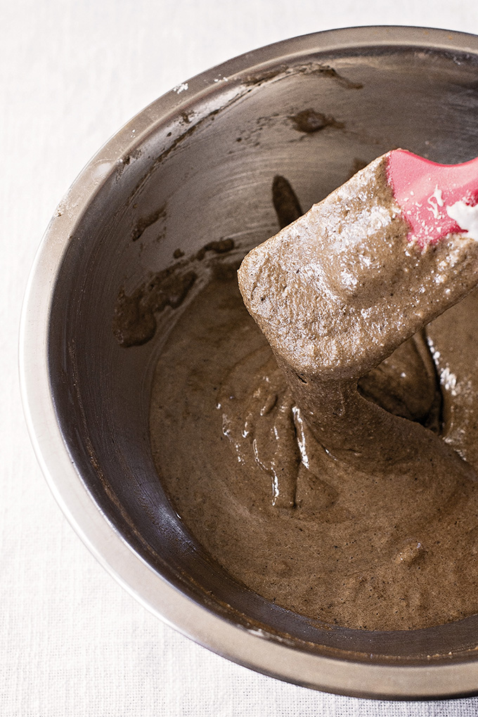 Properly folded macaron batter will be shiny and drizzle down from the spatula in slowly-falling parts