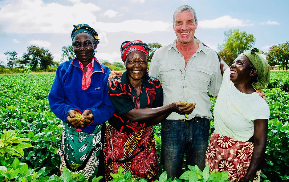 Team of ladies showing their harvest