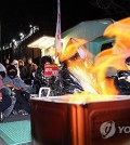 Braving the cold, protestors hold a rally calling for the impeachment of suspended President Yoon Suk Yeol in Seoul on Jan. 9, 2025. (Yonhap)