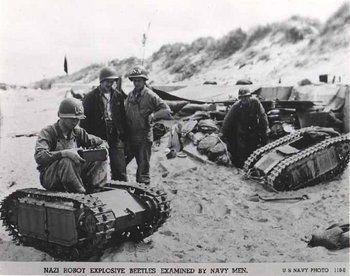 NAZI ROBOT EXPLOSIVE BEETLES EXAMINED BY NAVY MEN