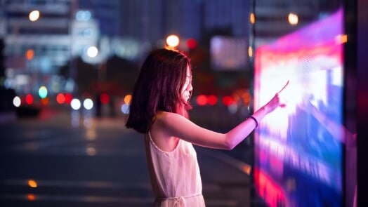 Woman working with virtual data