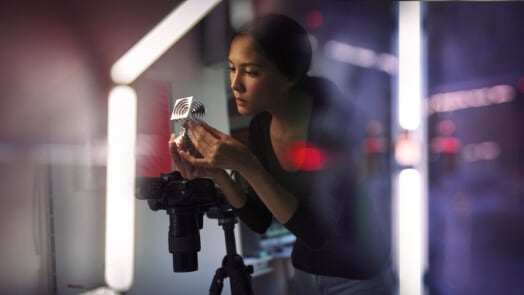 Woman holding a cube