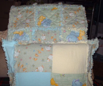 Debbie from NC makes this adorable baby rag quilt from duck fabric!