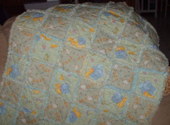 Debbie from NC makes this adorable baby rag quilt from duck fabric!